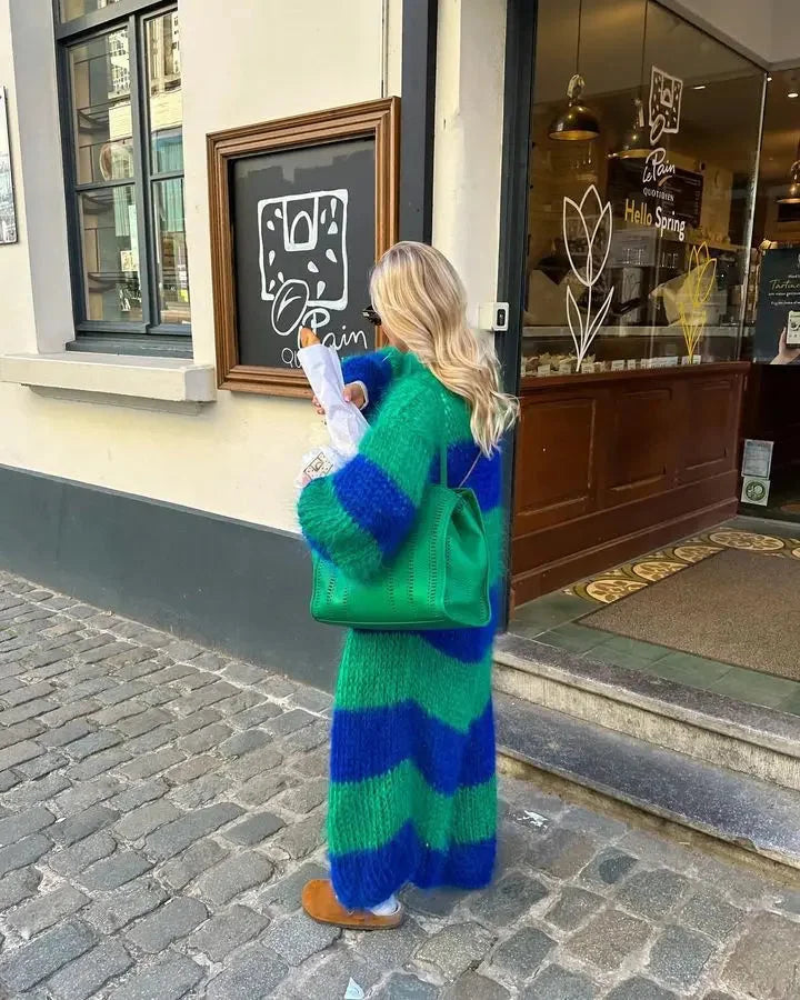 Women's striped knit long cardigan in soft fabric, featuring an open front, long sleeves, and a relaxed fit for comfort.