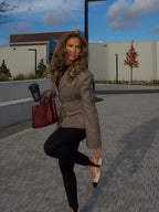 Women's tailored plaid blazer made of soft cotton, featuring gold buttons and a fitted design for a polished look.