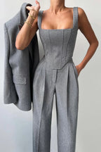 Women's tailored three-piece set featuring a fitted top, made from breathable cotton blend with structured design and subtle…