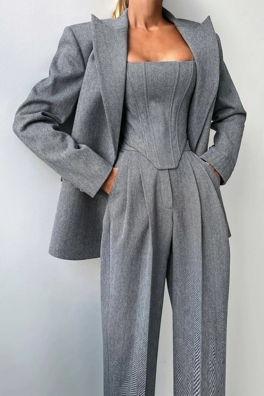 Women's tailored three-piece set featuring a fitted top, crafted from soft cotton blend with elegant seam detailing.