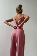 Women's tailored three-piece set featuring a fitted top, crafted from breathable fabric with a chic, structured design.