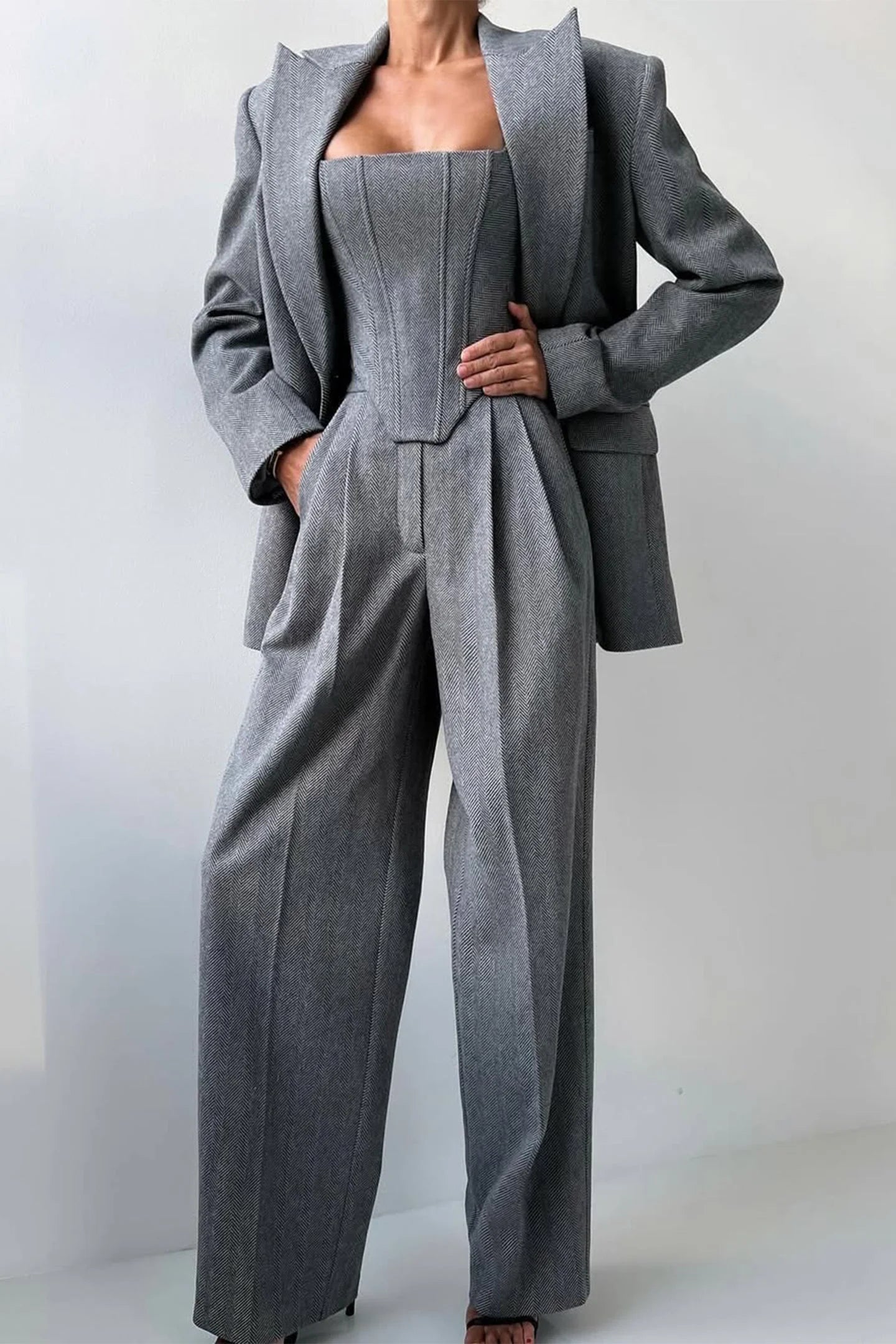 Women's three-piece set featuring a fitted top, crafted from breathable cotton blend, includes tailored pants and a…