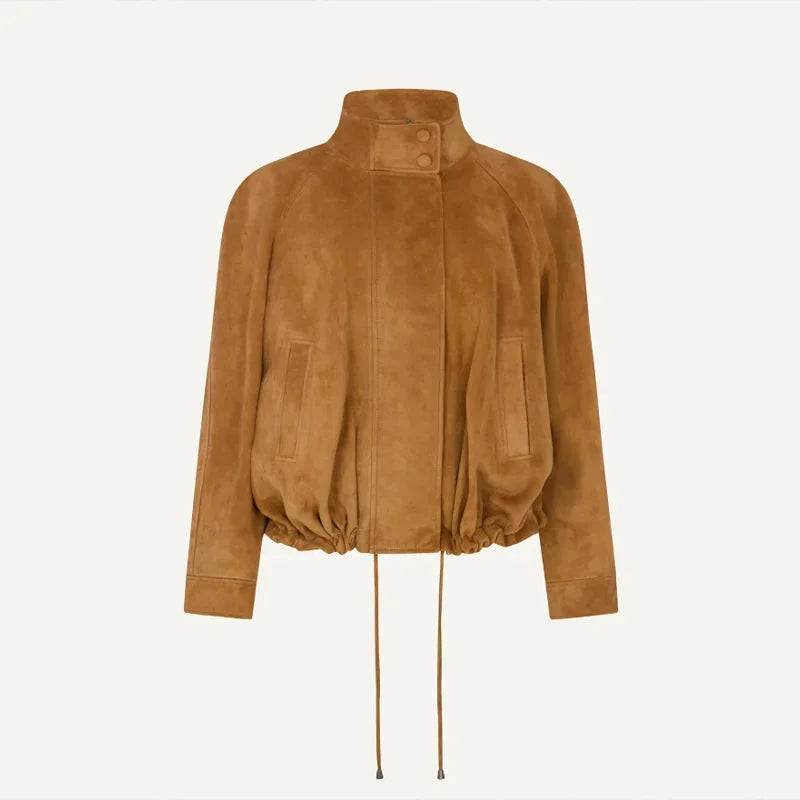 Women's tan standneck jacket, made from durable fabric, featuring a zipper closure and long sleeves for versatile styling.