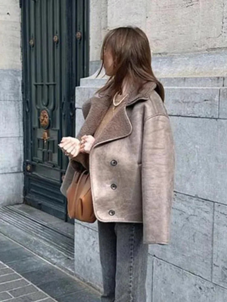 Women's taupe buttoned coat featuring a cozy shawl collar, crafted from soft fabric for comfort and warmth.