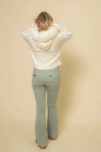 Women's taupe pullover sweater with a soft faux fur collar, featuring a cozy fit and long sleeves for added warmth.