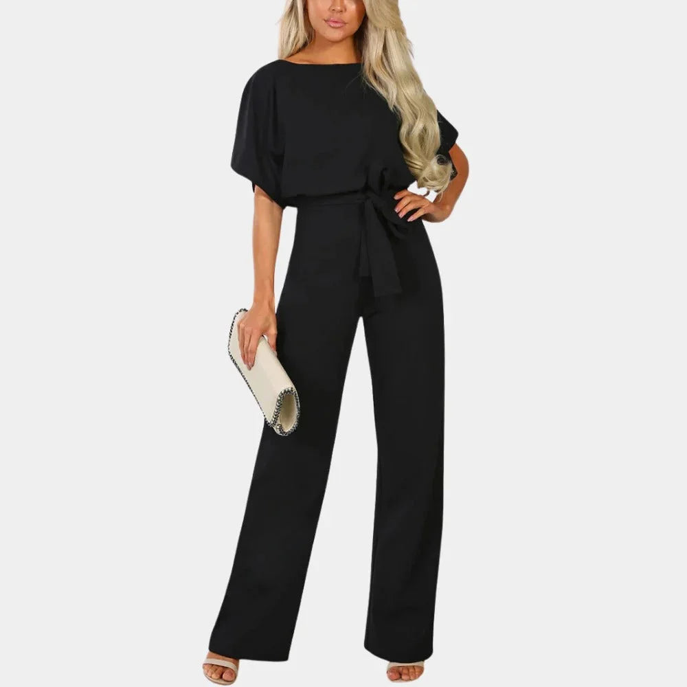 Women's tie-waist wide-leg jumpsuit in lightweight fabric, featuring kimono sleeves and a flattering silhouette for comfort.