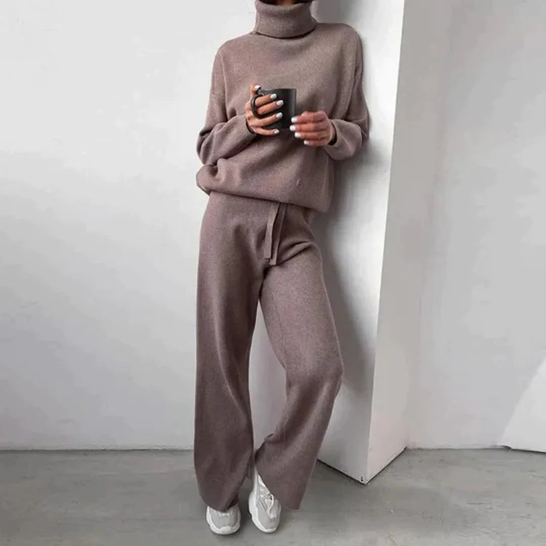 Women's taupe turtleneck and wide-leg pant set made from soft, breathable fabric, featuring a relaxed fit for comfort.