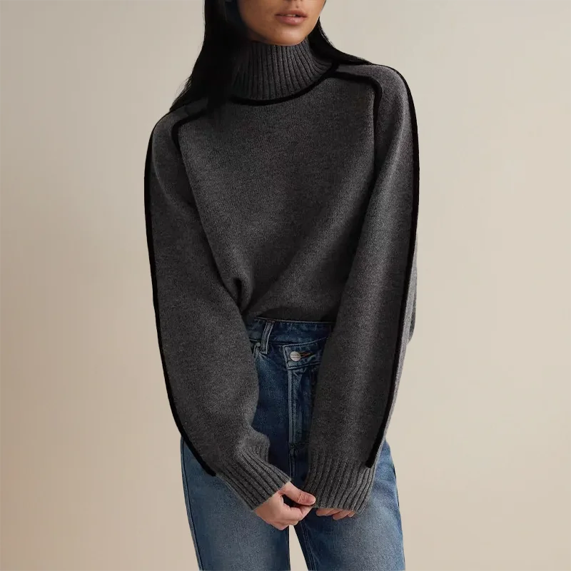 Women's turtleneck knit sweater featuring contrast trim, made from soft, warm fabric, ideal for layering in colder weather.