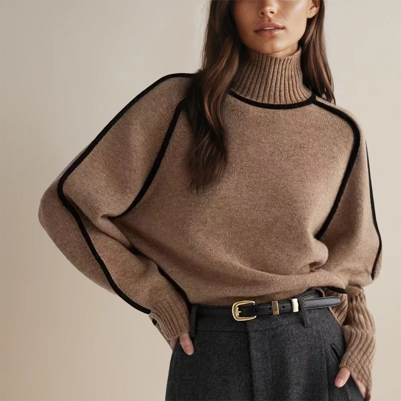Women’s turtleneck knit sweater featuring contrast trim, crafted from soft acrylic for warmth and comfort in cooler weather.