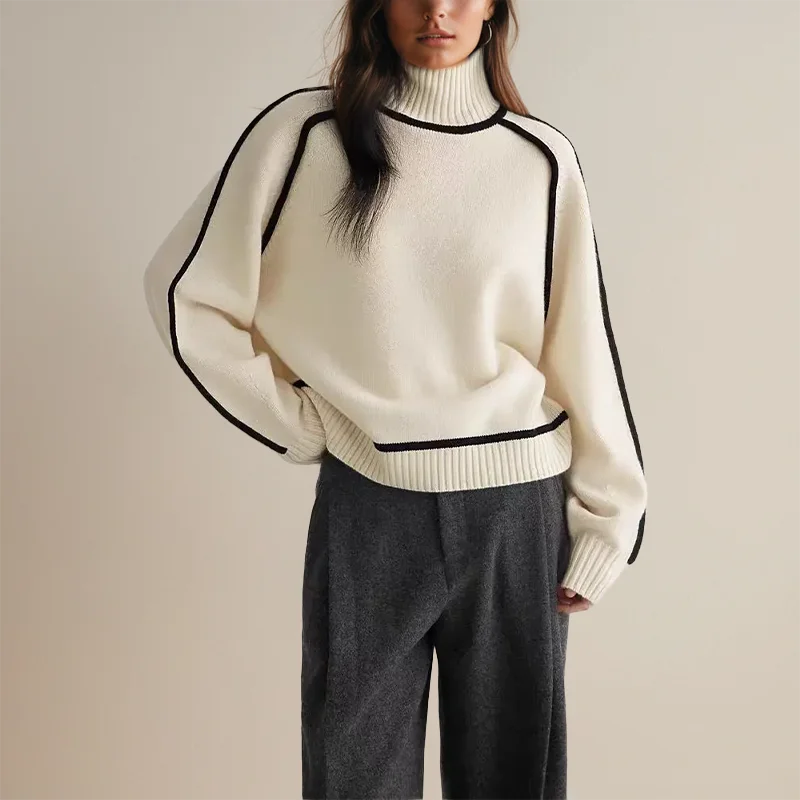Women's turtleneck knit sweater featuring contrast trim, made from soft cotton blend for cozy wear during colder seasons.