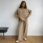 Comfortable women's turtleneck loungewear set in soft fabric with a relaxed fit, perfect for casual wear at home.