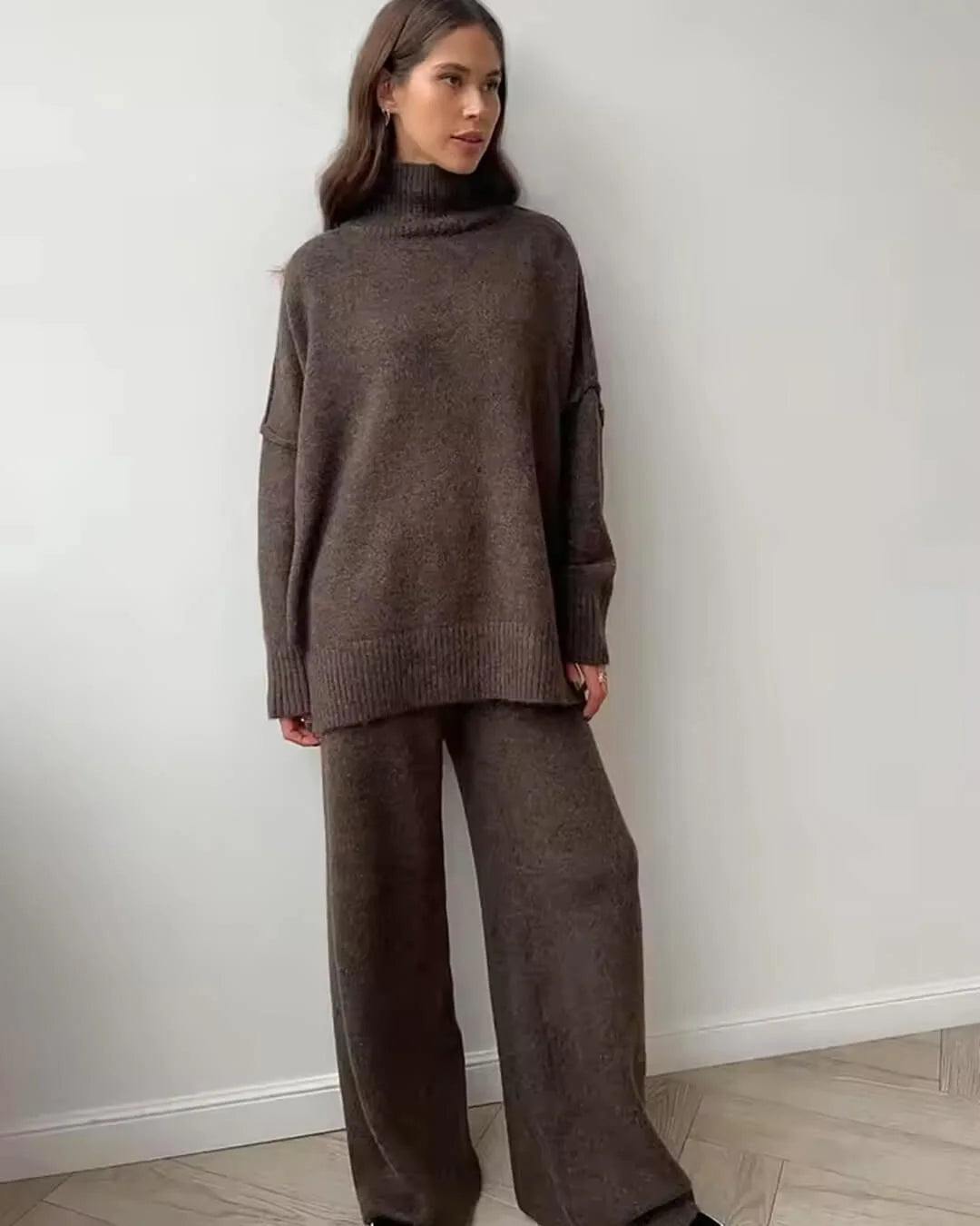 Women's relaxed fit turtleneck loungewear set made from soft cotton blend for comfort and ease during casual wear.