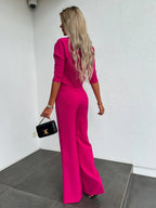 Women's two-piece set featuring a cropped top and high-waist pants, made from soft cotton blend for comfort and style.