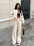 Women's urban lounge set featuring a relaxed fit, soft cotton blend material, and practical pockets for everyday comfort.