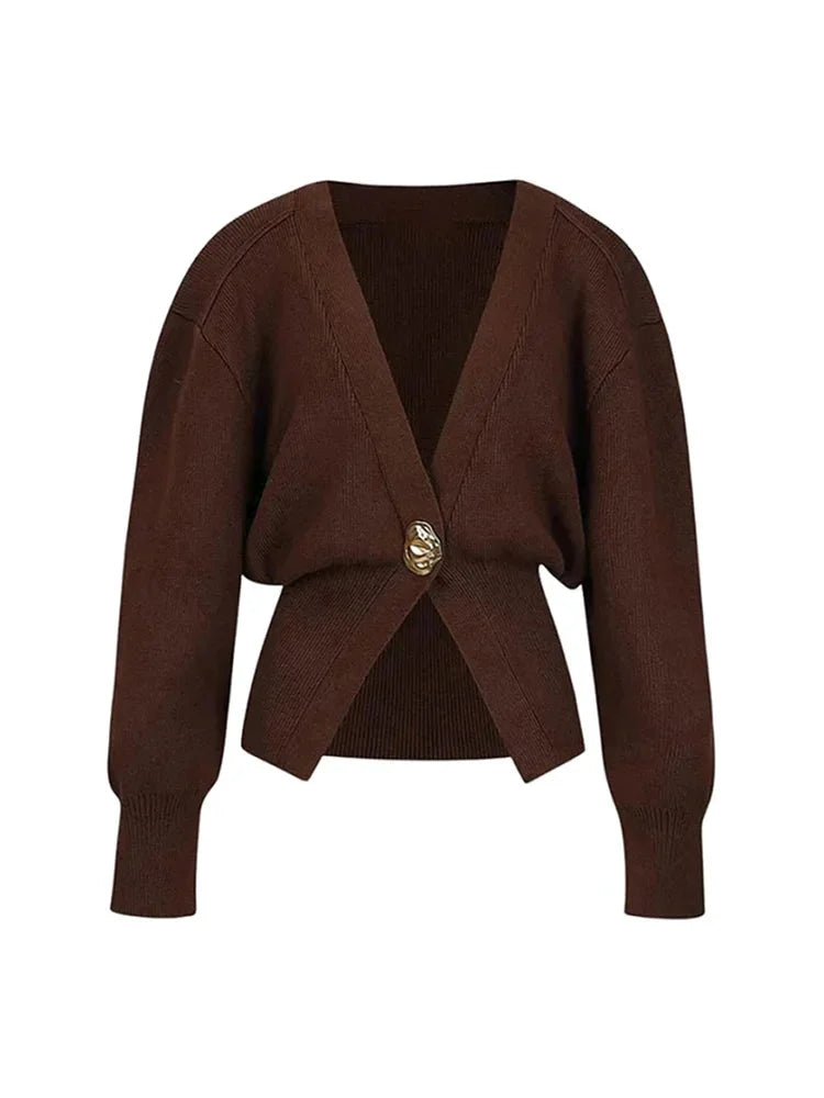 Women's V-neck cardigan featuring a unique button trim, made from soft, comfortable fabric for everyday wear.