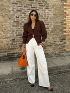 Women's V-Neck Cardigan featuring unique button trim, crafted from soft, breathable fabric for comfortable layering.