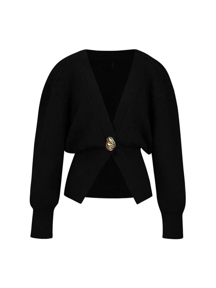 Women's V-neck cardigan crafted from soft knit fabric, featuring a unique button trim and a slim fit design for everyday…