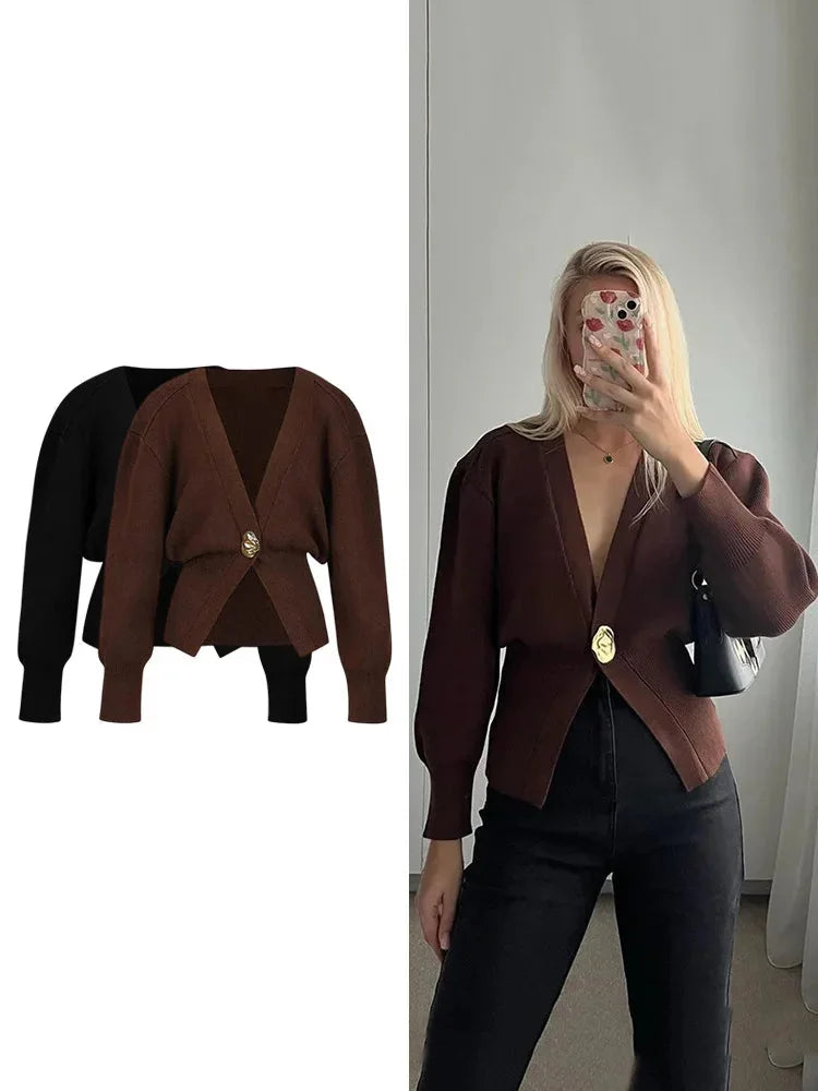 Women's V-neck cardigan featuring a soft fabric and unique button trim for a stylish, casual look. Perfect for layering.