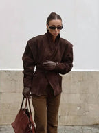 Women's V neck long sleeve jacket with a single button closure, crafted from soft fabric for a tailored fit and versatility.