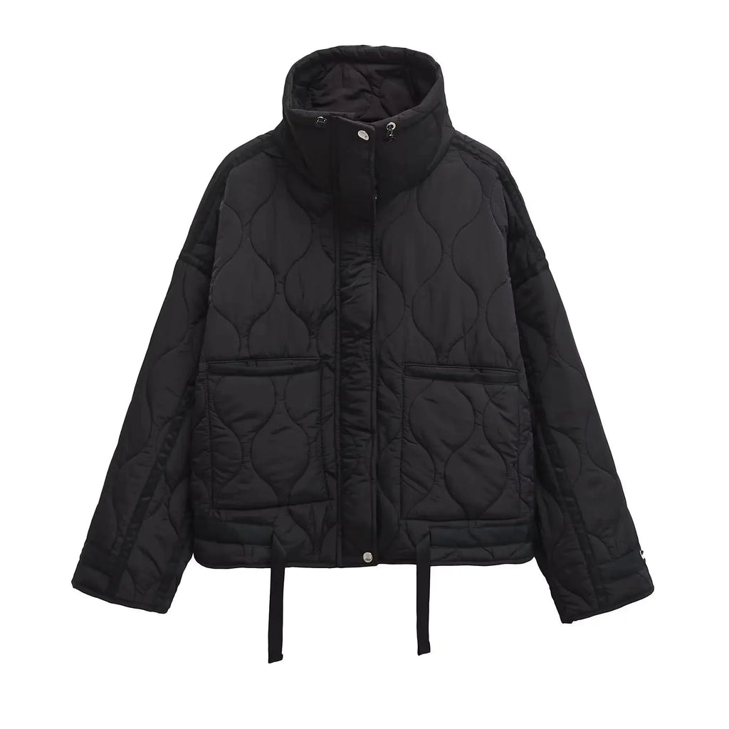 Women's winter high collar loose fit quilted jacket made of durable fabric with cozy insulation for warmth and comfort.