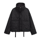 Women's winter high collar loose fit quilted jacket made of durable fabric with cozy insulation for warmth and comfort.