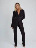Women's wrap blazer with tie waist, long sleeves, crafted from soft fabric for a stylish and comfortable fit.