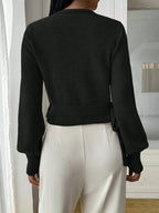 Women's wrap knit cardigan with tie waist, featuring soft fabric, open front design, and adjustable waist for a customizable…