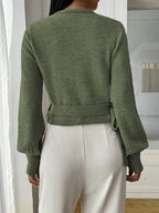 Lightweight women's wrap knit cardigan with tie waist, featuring soft fabric and versatile design for layering in any season.