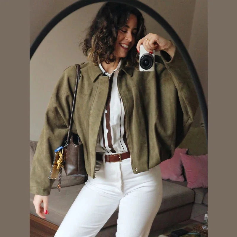 Women's zip-up bomber jacket in durable fabric, featuring long sleeves, a stylish lapel, and a relaxed fit for comfort.