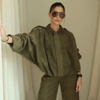 Women's zip-up bomber jacket in lightweight fabric, featuring long sleeves, a stylish lapel, and a relaxed fit.