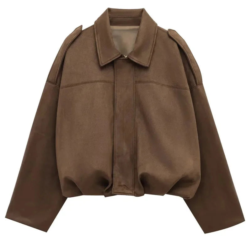 Women's zip-up bomber jacket in soft fabric, featuring long sleeves, lapel, and ribbed cuffs for a casual, stylish look.