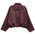 Women's zip-up bomber jacket with long sleeves and lapel, featuring a lightweight material and ribbed cuffs for a casual fit.