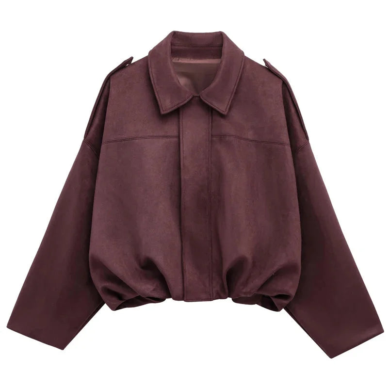 Women's zip-up bomber jacket with long sleeves and lapel, featuring a lightweight material and ribbed cuffs for a casual fit.