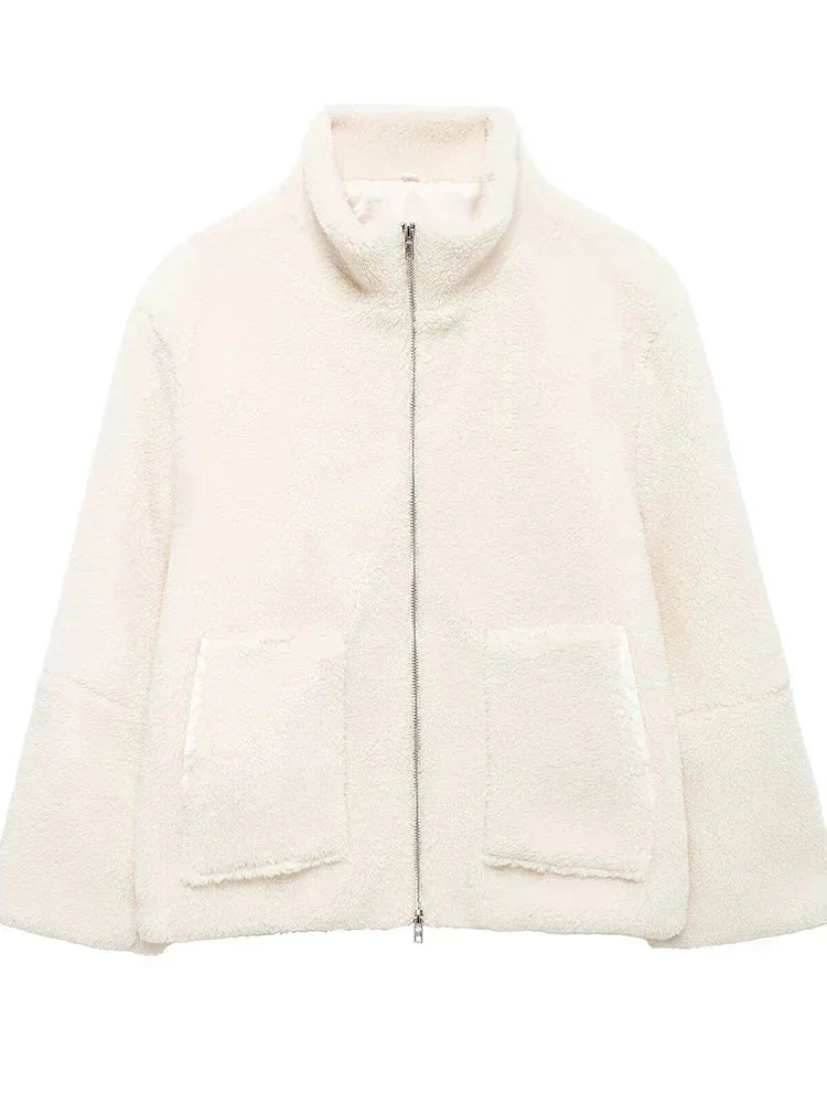 Women’s zip-up fleece jacket with stand collar, featuring soft polyester fabric and a cozy, warm design for comfort.