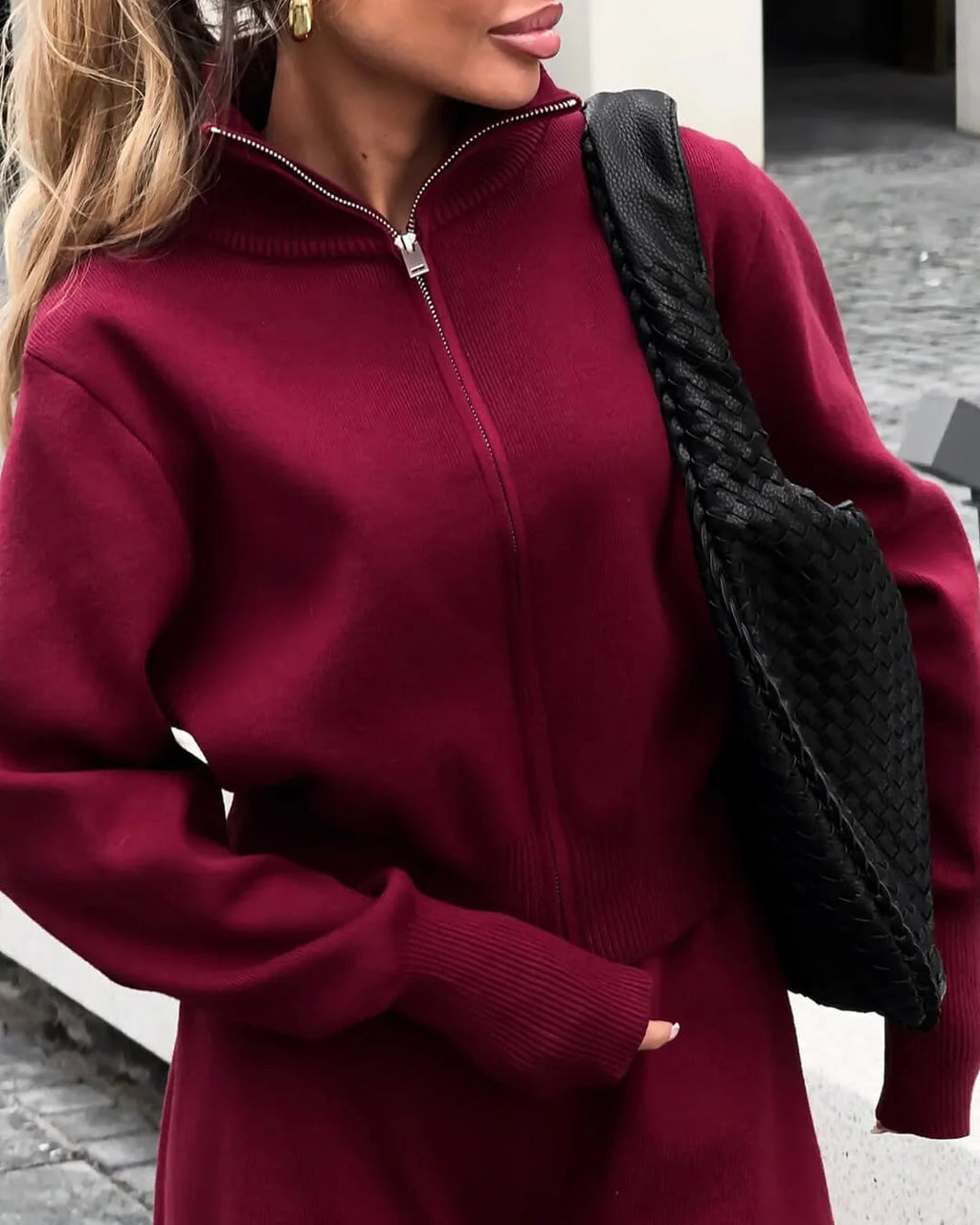 Women's knitted cotton loungewear set featuring a zipper front design for comfort and ease; ideal for relaxing at home.