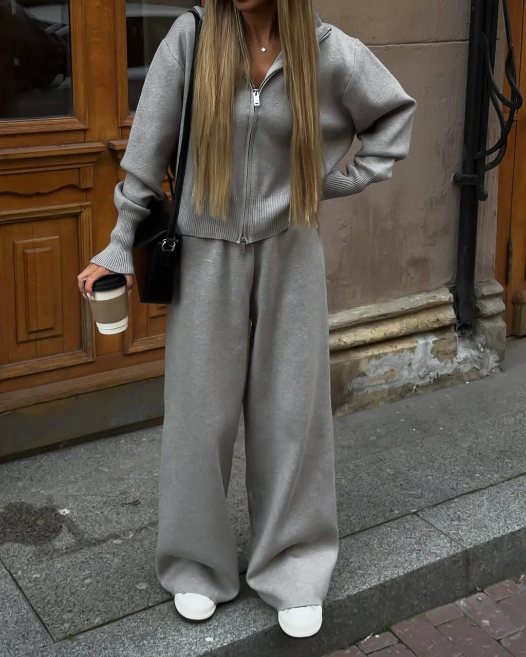 Women's knitted cotton loungewear set featuring a zipper-front design for easy wear and comfort.